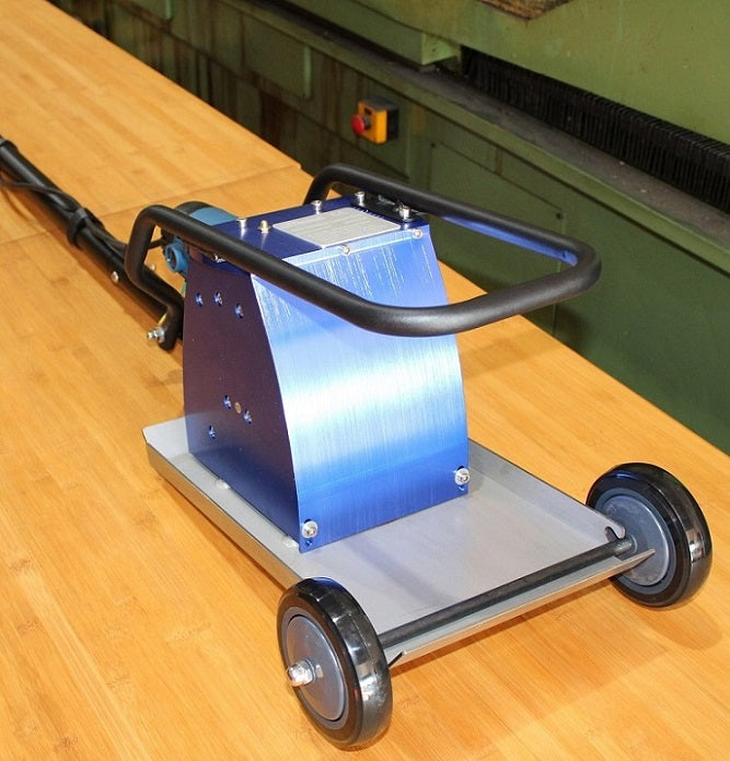 Laser slag cleaner for laser cutting table cleaning