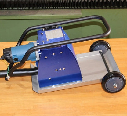 Laser slag cleaner for laser cutting table cleaning